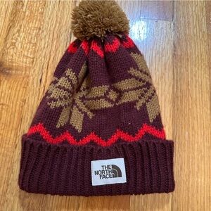 The North Face Fair Isle Pom Beanie in a maroon and brown SZ One size (v)